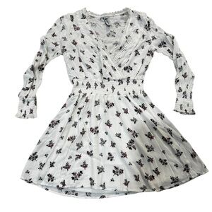 American Rag white floral A line mini skirt, elastic waist, long sleeves, XS.